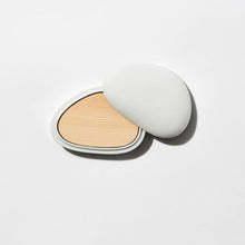 Load image into Gallery viewer, A white, two-piece porcelain Kohgou diffuser container with its lid off, revealing a Hinoki wood plate inside.