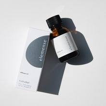 Load image into Gallery viewer, A bottle of diffuser oil labeled 'nukubai' from elemense, placed on a grey surface with its packaging box beside it.
