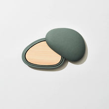 Load image into Gallery viewer, A green, two-piece porcelain Kohgou diffuser container with a removable Hinoki wood plate inside, displayed open on a white background.
