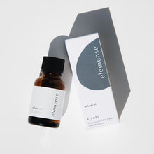 Load image into Gallery viewer, A bottle of Elemense diffuser oil labeled 'kiyobi' next to its packaging box, with a minimalist design in a monochrome setting.

