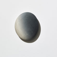 Load image into Gallery viewer, Three ceramic stones in white and gray colors, designed to be used as a diffuser for fragrance.
